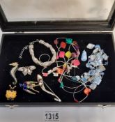 A box of costume jewellery