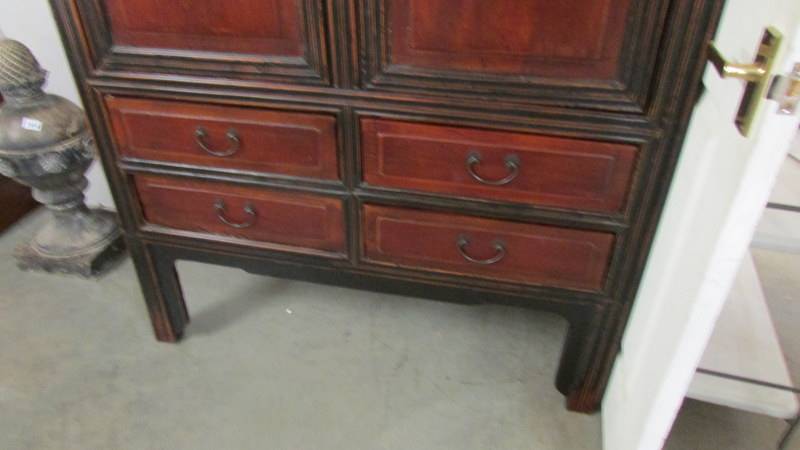 An old Chinese 'Marriage' cabinet. - Image 4 of 4