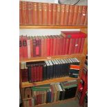 A large quantity of vintage hard back books including a set of Dickens, H G Wells etc.