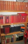 A large quantity of vintage hard back books including a set of Dickens, H G Wells etc.