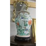 A large Chinese lidded jar.