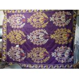 A large antique bed throw, some damage in places, (230 x 240 cm).