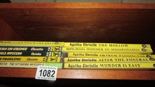 A collection of Agatha Christie Fontana and Pan books.
