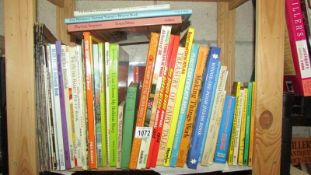 A quantity of children's books including Kate Greenaway, Winnie the Pooh etc.