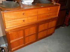 A Nathan teak 4 drawer, 2 door sideboard. ****Condition report**** 102cm wide.