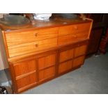 A Nathan teak 4 drawer, 2 door sideboard. ****Condition report**** 102cm wide.