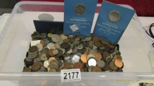 A large quantity of pre decimal UK and foreign coins.