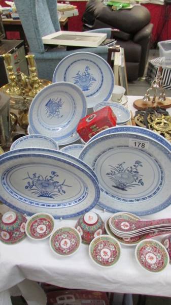 A quantity of Chinese plates and dishes.