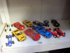 A selection of scalextric cars including Triumph, Ferrari etc.