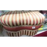 An upholstered stool.