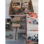 A quantity of collectors cards and an album of cards including The Homeland series