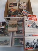 A quantity of collectors cards and an album of cards including The Homeland series