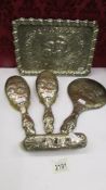 A five piece dressing table set comprising 4 silver backed featuring angels and a matching EPNS