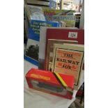 A quantity of railway related books together with a boxed Hornby train.