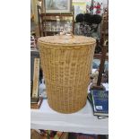 A wicker linen basket.