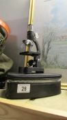 A Skybolt student microscope.