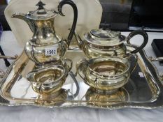 A 4 piece silver plated teaset on tray