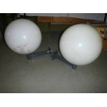 A pair of white plastic globe wall lights (38cm diameter)