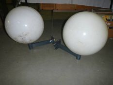 A pair of white plastic globe wall lights (38cm diameter)