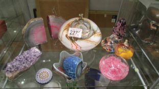 A mixed lot of glass paperweights, crystal bookends etc.