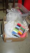 A box of assorted sewing items including bridal veil.