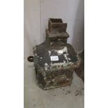 A cast iron gutter collector box.