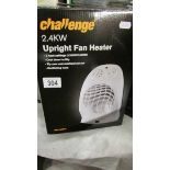 A boxed Challenge 2.4kkw upright fan heater.