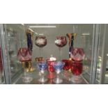 A good mixed lot of coloured and gilded wine glasses.