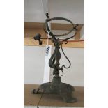 An art nouveau brass oil lamp base suitable for drop in font.