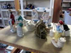 A selection of continental porcelain and bisque figures