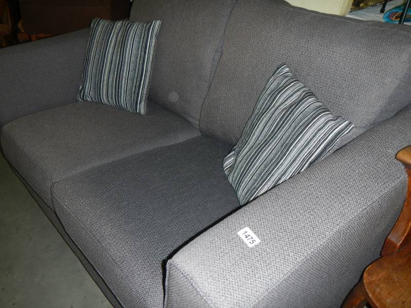 A grey fabric 2 seater sofa with 2 matching cushions - Image 2 of 2