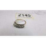 An 18ct yellow gold diamond ring, size M half, total 2.9 g.