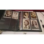 Three albums of movie star postcards (approximately 280).