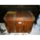 A brass bound oak ply treasure chest style coal box with liner