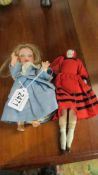 An Armand Marseille bisque doll No. 971 and a china head dolls house doll.