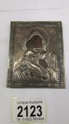 A Russian 1890 silver covered icon 'Madonna and Child' by Aleksey Spiridonav.