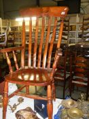 A Victorian high back carver chair (back loose).