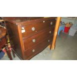 A mahogany 3 drawer chest.