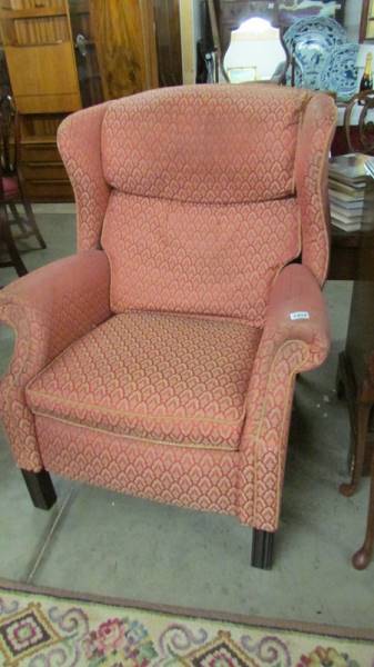 A fully reclining wing arm chair, in good condition but would benefit from a clean. - Image 4 of 4
