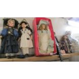 Seven porcelain collector's dolls.