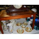 A retro teak coffee table with tiled top.