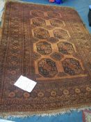 A large Chinese carpet, 274 x 183 cm.