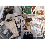 A quantity of old photographs and postcards