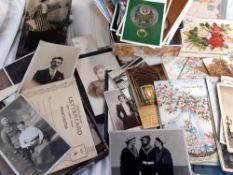A quantity of old photographs and postcards