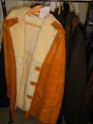 A quantity of large jackets including one sheepskin and a Taybury wax jacket, various sizes.