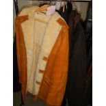 A quantity of large jackets including one sheepskin and a Taybury wax jacket, various sizes.