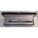 A ladies Timex wrist watch in box