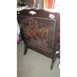 An oak fire screen.