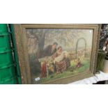 A Victorian gilt framed and glazed print of a family in a garden.