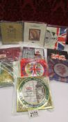 Ten Royal MInt UK brilliant uncirculated coin collection sets, 1990 - 1999.
